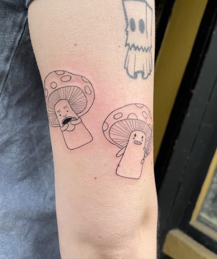 fine line mushroom characters arm tattoo by Ale Muñoz, Philadelphia PA