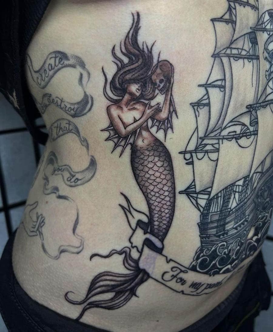 black grey mermaid pirate ship ribs tattoo by BG Galdes, Philadelphia PA