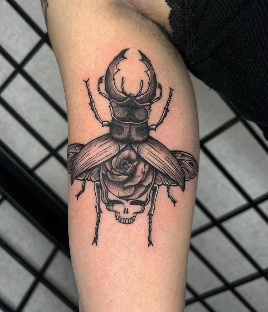black grey stag beetle rose skull arm tattoo by BG Galdes, Philadelphia PA