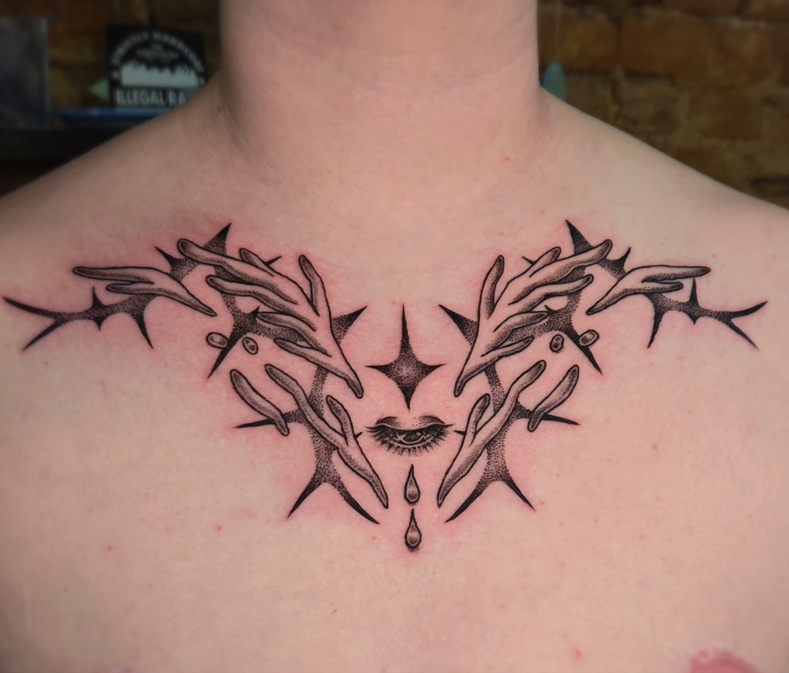 dotwork thorn hands crying eye chest tattoo by Bird, Philadelphia PA