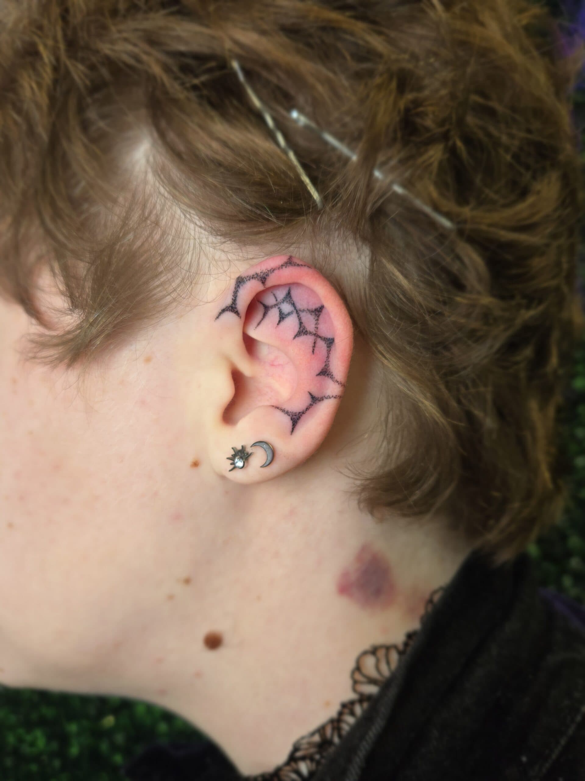 spiderweb ear tattoo by Bird, Philadelphia PA