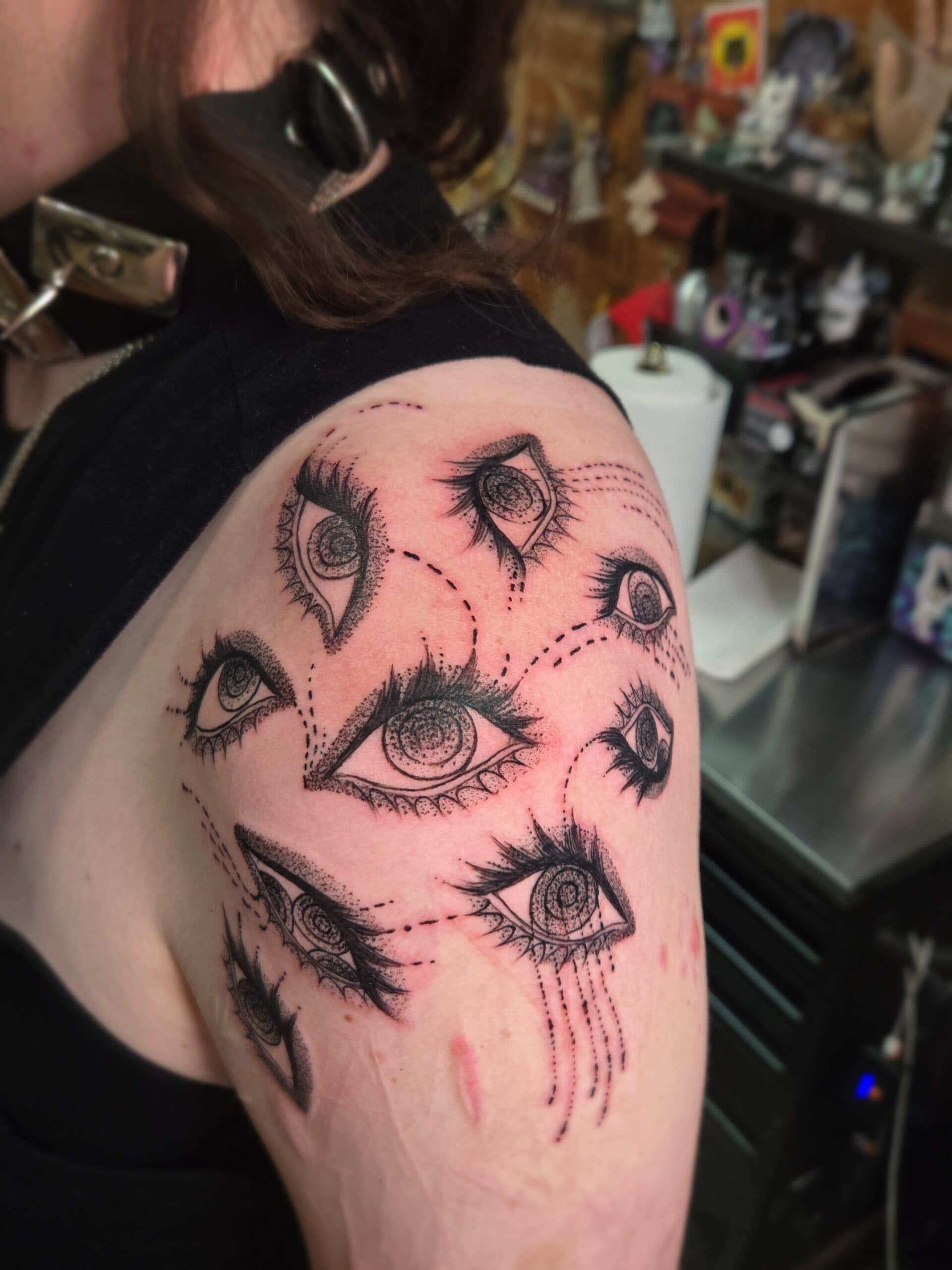 surreal eyes shoulder tattoo by Bird, Philadelphia PA