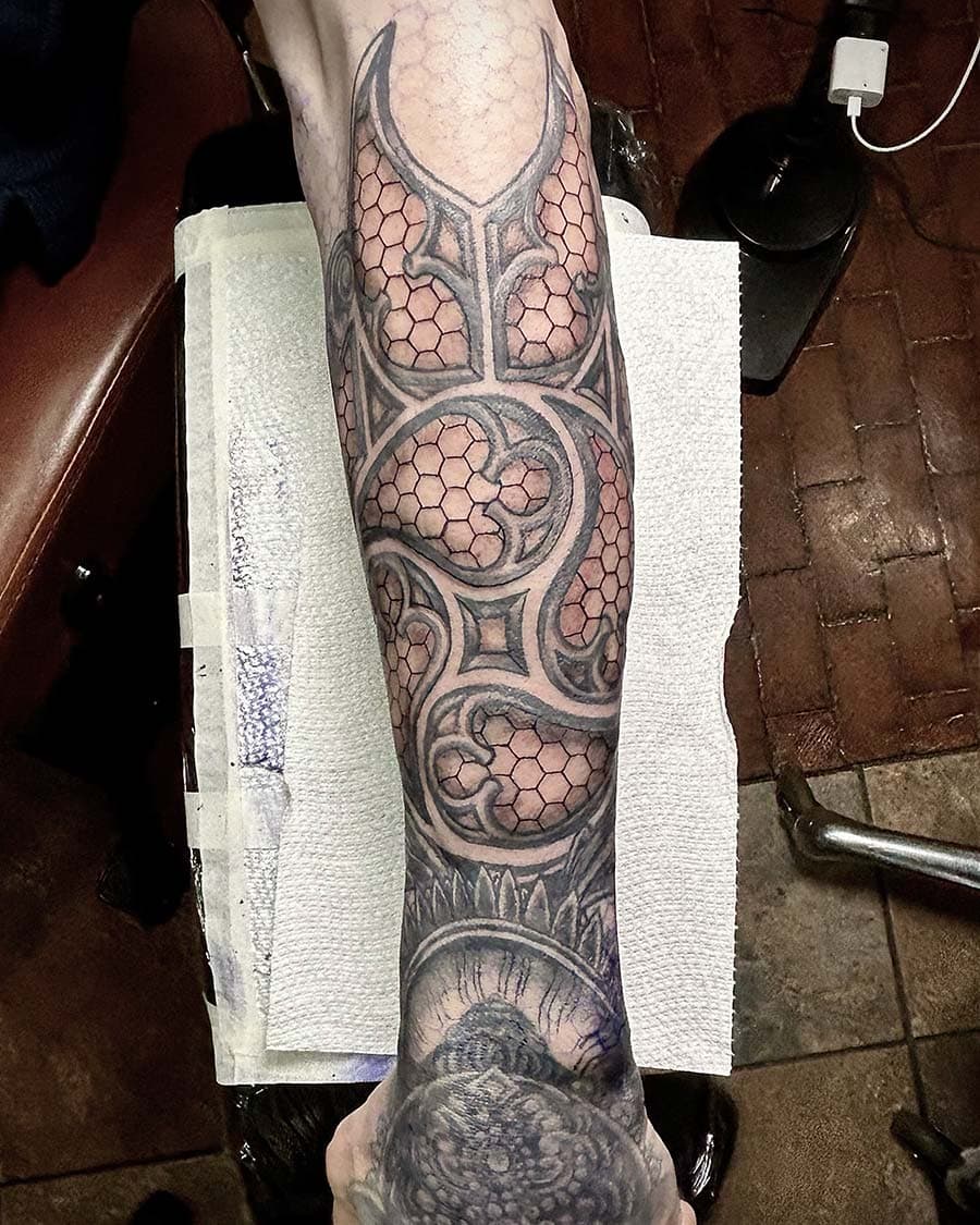 geometric honeycomb leg sleeve tattoo by John Howie, Philadelphia PA
